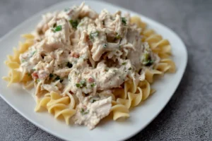 Preparing Crock Pot Chicken Alfredo step by step Creamy Crock Pot Chicken Alfredo ready to eat Serving Crock Pot Chicken Alfredo with garlic bread and salad