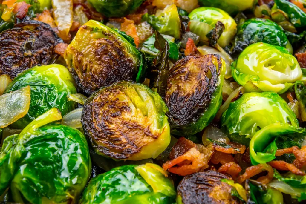 Crispy air fryer Brussels sprouts on a serving plate.