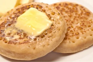 Cooking sourdough discard pancakes on a skillet