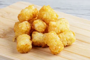 Golden air fryer tater tots after cooking.