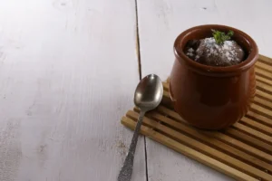 Achieving the perfect mug cake texture with a gooey center.