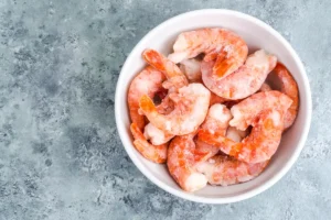 Frozen shrimp in air fryer basket